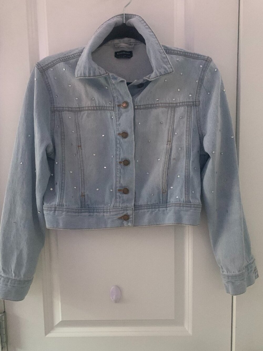 Bebe half bedazzled cropped denim jacket
